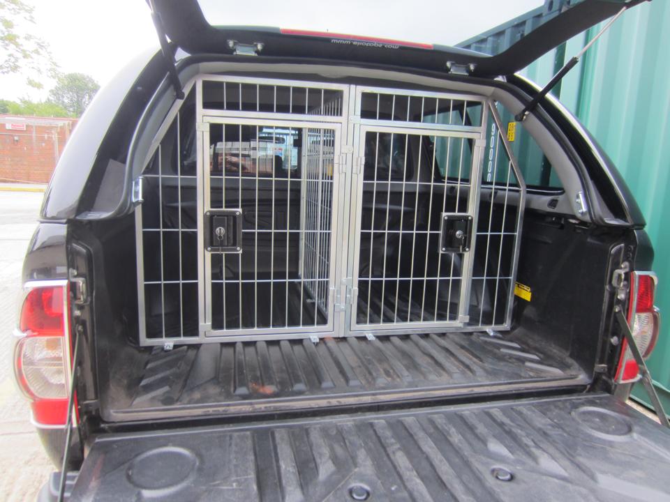 Nissan navara dog cage best sale